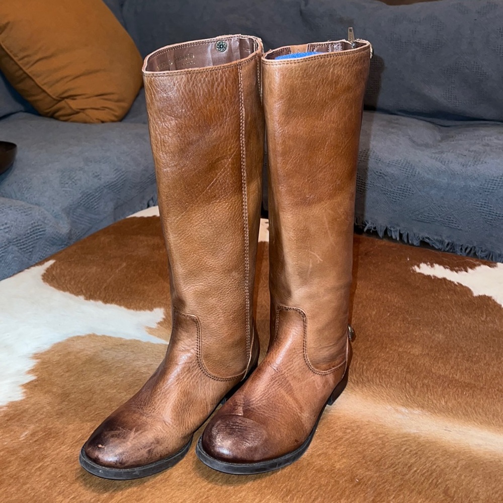 Arturo Chiang riding boots.